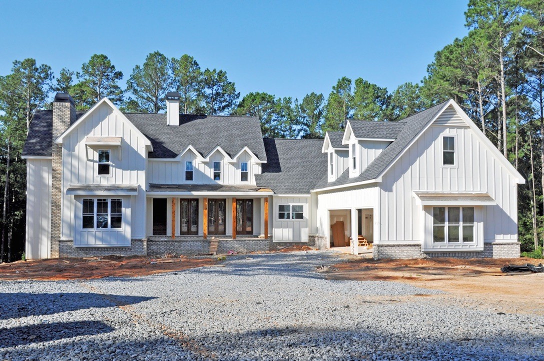 Completed white custom home exterior