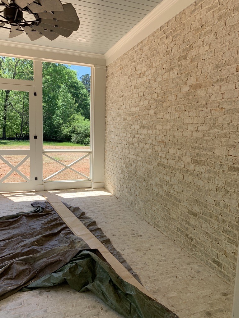 Stone wall and interior finishes in progress