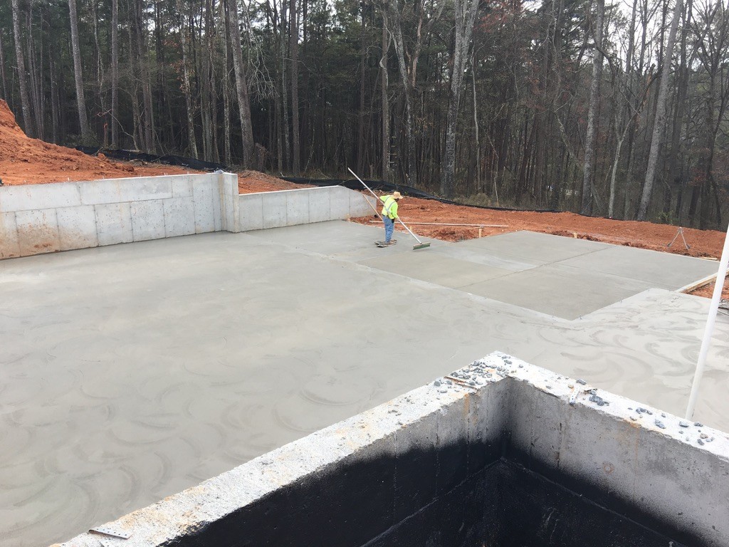 Concrete foundation slab and basement walls