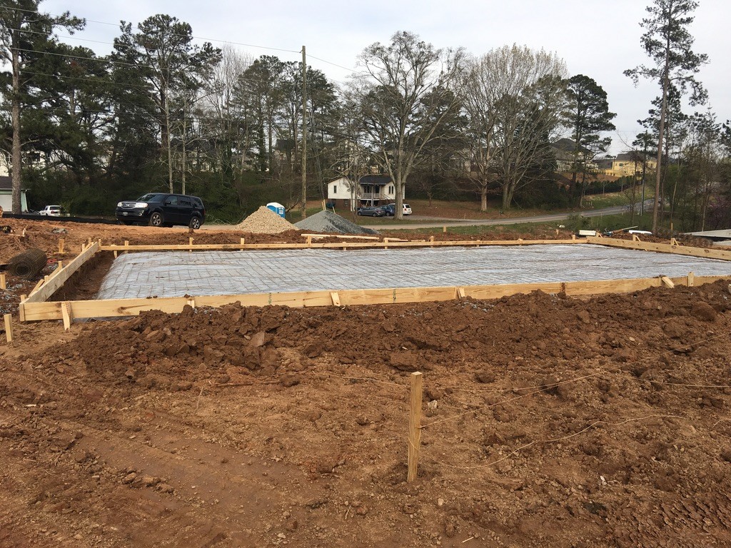 Foundation work on a wooded building site